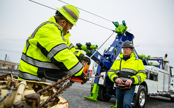 Men working on a wrecker